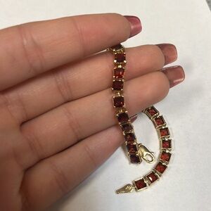 434229 14k garnet bracelet